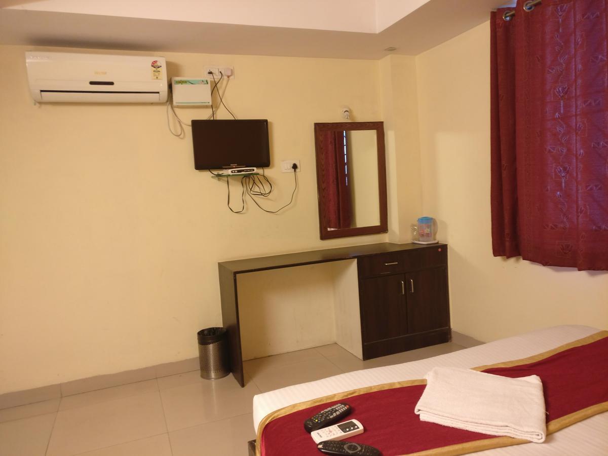 Hotel Skyland Bangalore Esterno foto